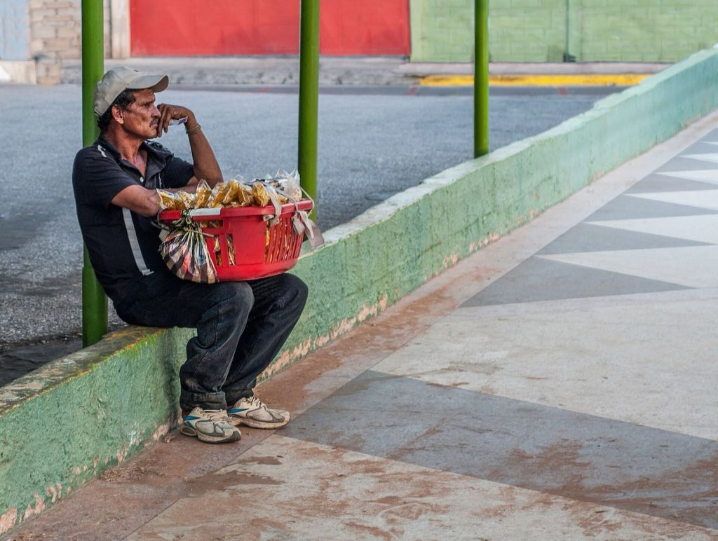 A bad sales day — street salesman in downtown Maracaibo, Venezuela