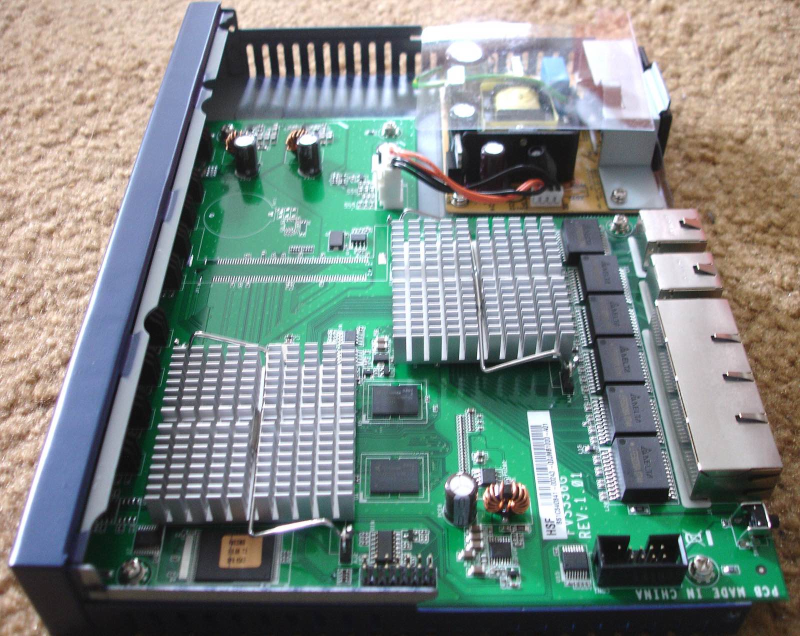 Netgear FVS336G network appliance inside.