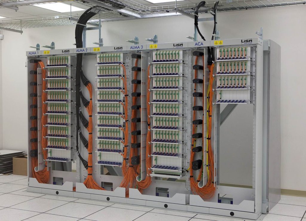 The fibre optic patch panel in the ALMA Array Operations Site (AOS) technical building, at an altitude of 5,000m on the Chajnantor plateau. Fibre optics bring the signals from the