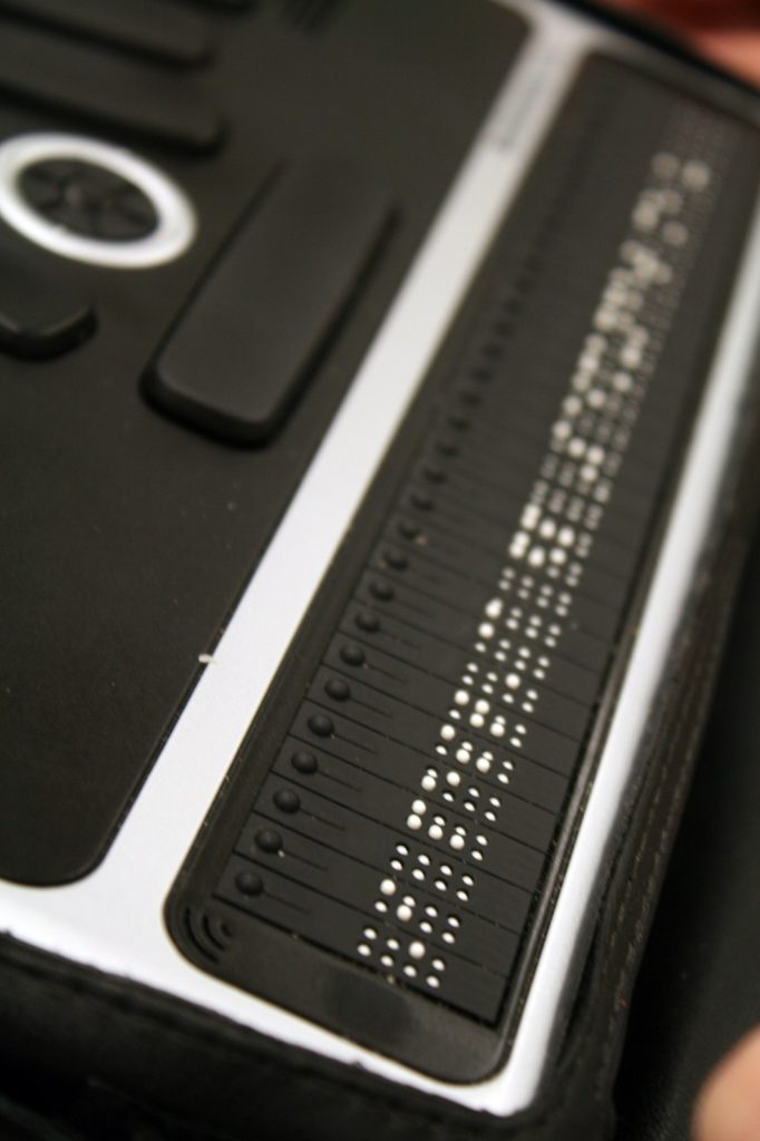 A BrailleNote Apex note-taker, a portable computer with a braille keyboard and display.